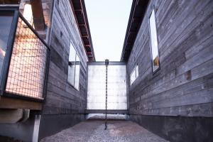Corral Board a Shipping Container House