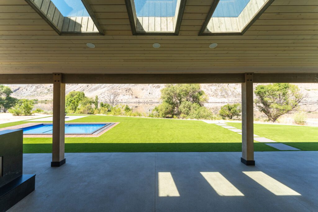 Wood Siding Covered Patio looking out to pool