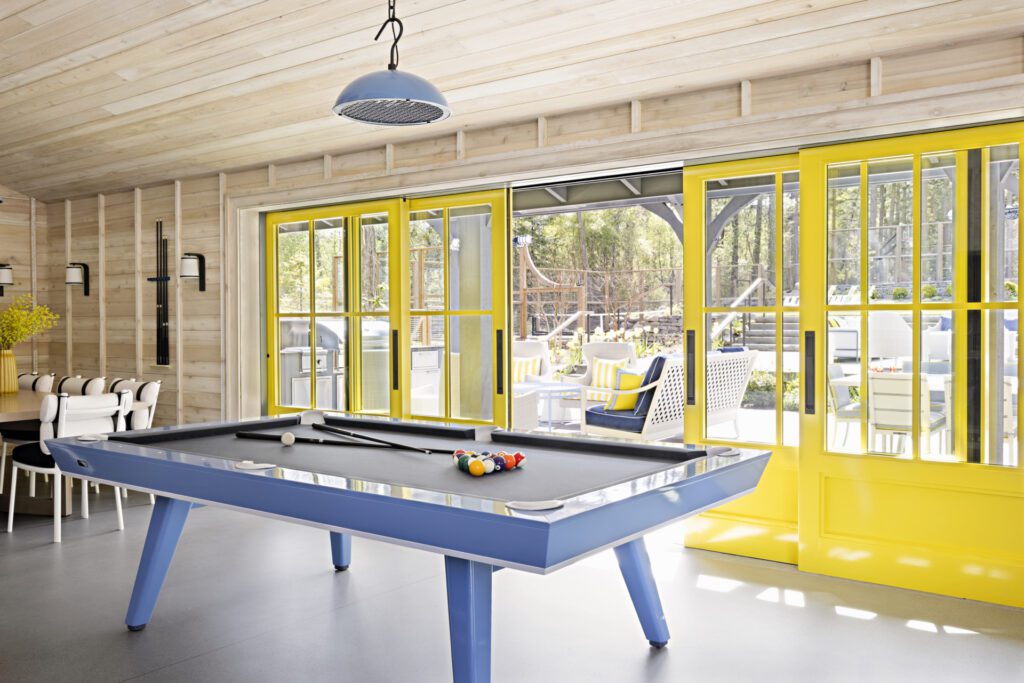 Karyn_Millet__KM_Yellow_sliding-doors Pool Table AquaFir White San Juan Island Interior Design