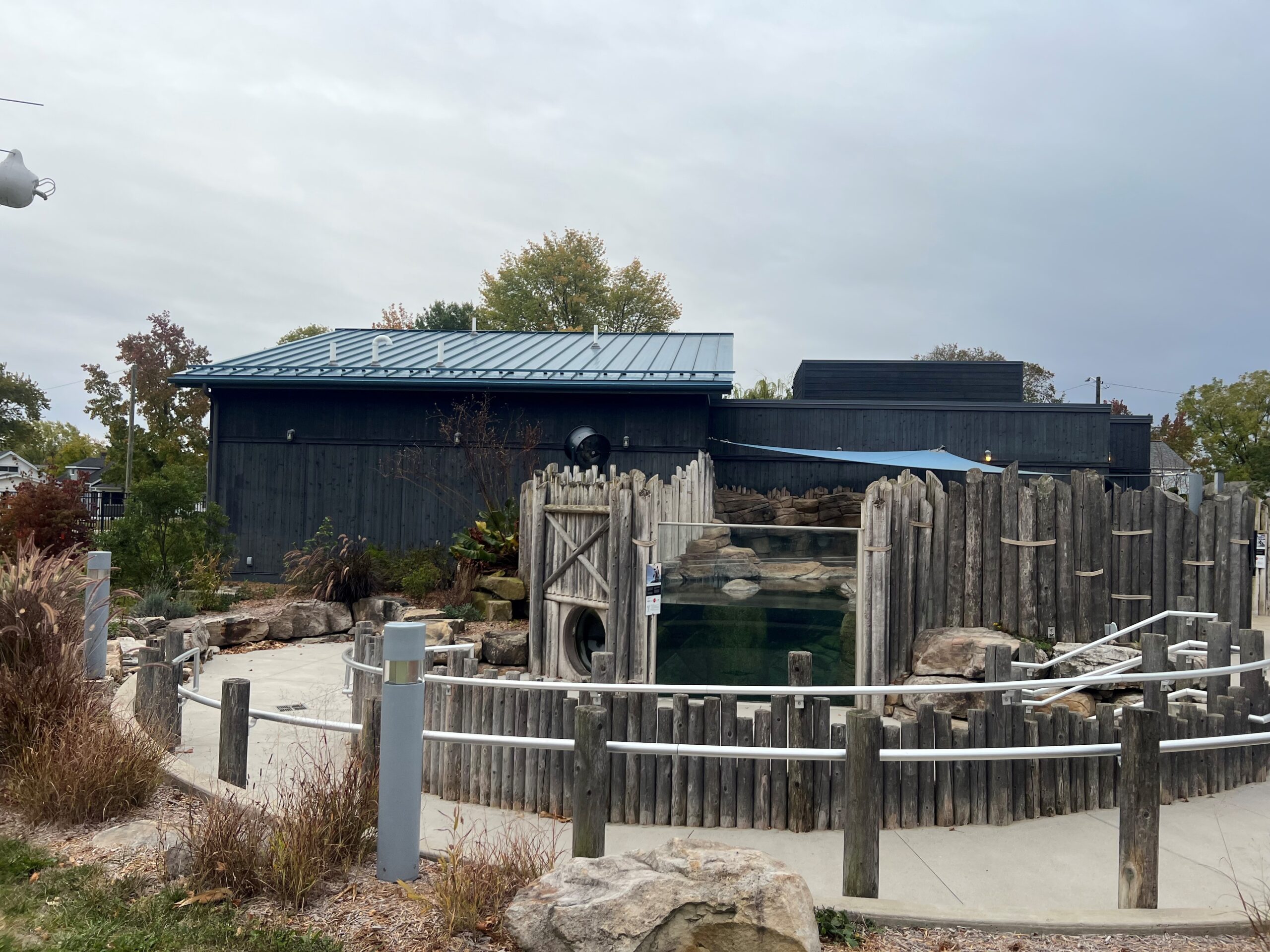 After wood stain reApplication - 7 year update, penguin zoo exhibit enclosure