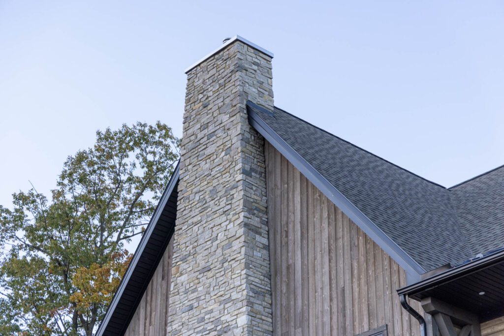 stone chimney ranchwood artisan vertical cedar siding