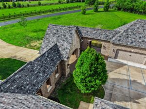 Kentucky equestrian estate entrance drone shot