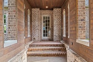 steps masonry with ranchwood eastern cedar siding