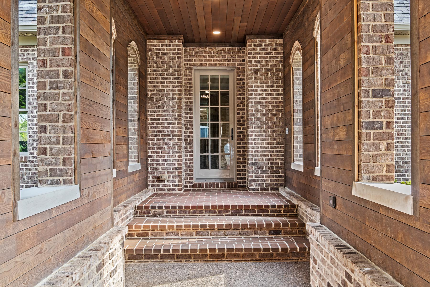 steps masonry with ranchwood eastern cedar siding