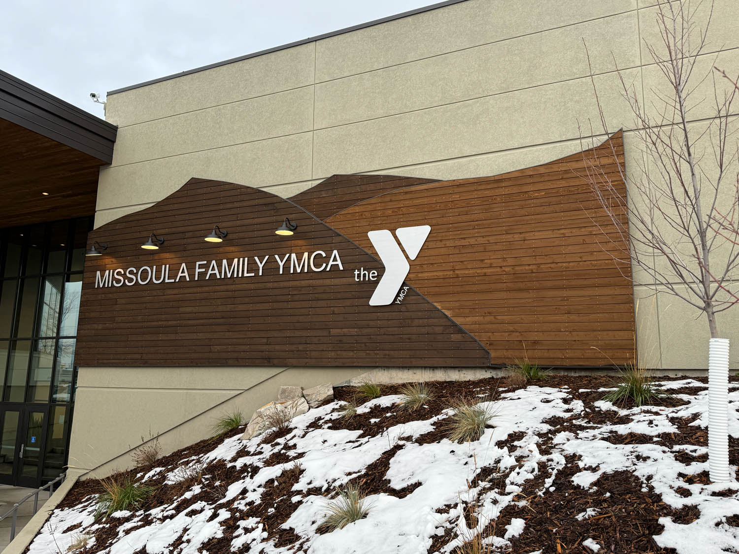 Entrance Sign featuring MTP Cedar Siding in the snow